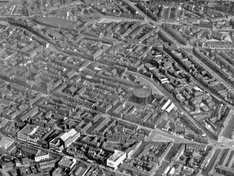 Sheffield city centre in 1935, showing The Moor in the foreground and an old gasometer