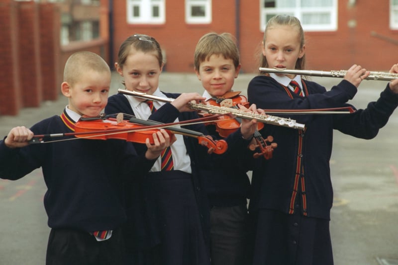 Children from Waterloo Primary School with instruments bought with money raised by the Queendeans association. L-R Ryan Partington,Natalie Bevan, Mark Podesta and Sarah Grime