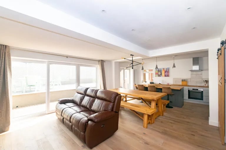 A superb open living kitchen is the heart of the home.