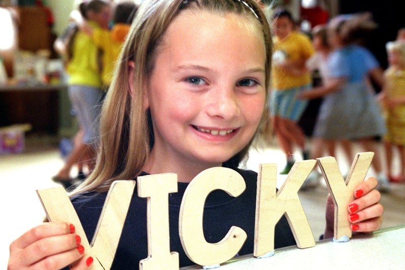 Children's Holiday Club feature at Whitegate Baptist Church, Blackpool. Nine year old Victoria Crawford has fun with the cut-out letters