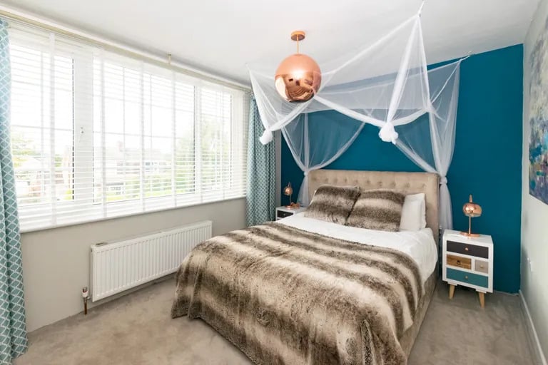 On the first floor are four cosy bedrooms.
