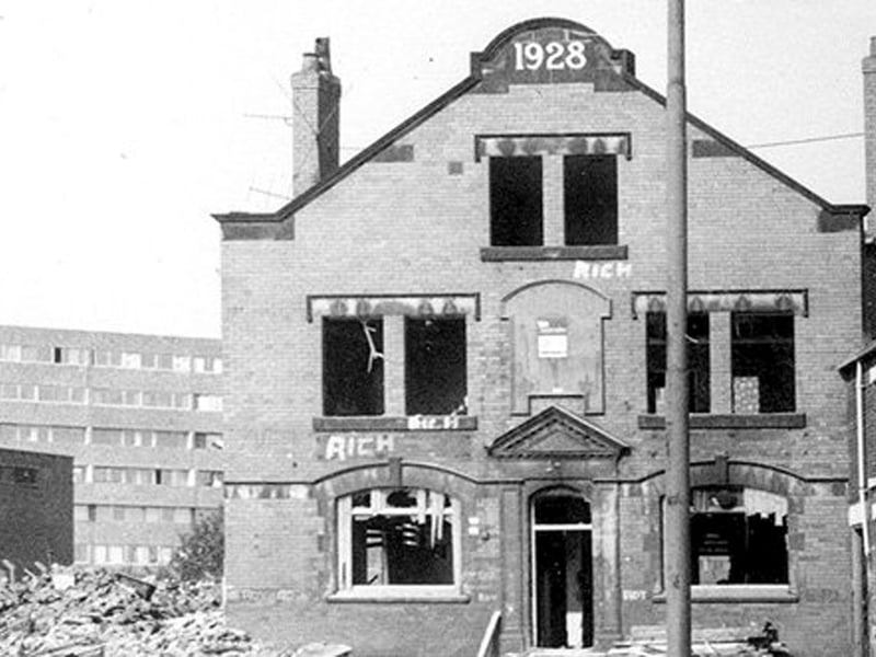A very dilapidated Spotted Dog, once located on Church Street. It has the datestone of 1928 on the decorative gable of the roof. This building must have been built to replace the original Spotted Dog which is listed in old directories of the 19th century at this address. The Spotted Dog was due for demolition at the time this photograph was taken in the early 1970s. Part of Leek Street Flats (Hunslet Grange) are visible in the background, left.
