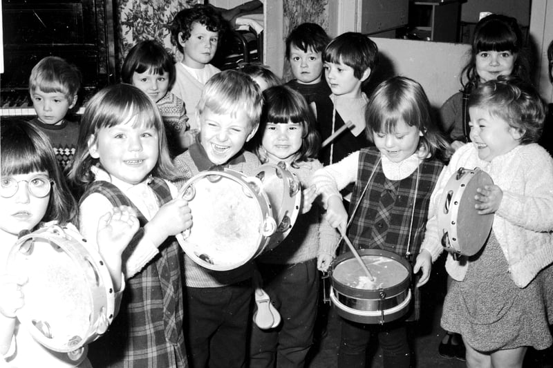 Children playing musical instruments during a birthday party at Albany nursery school in Madeira Street Edinburgh in November 1967.