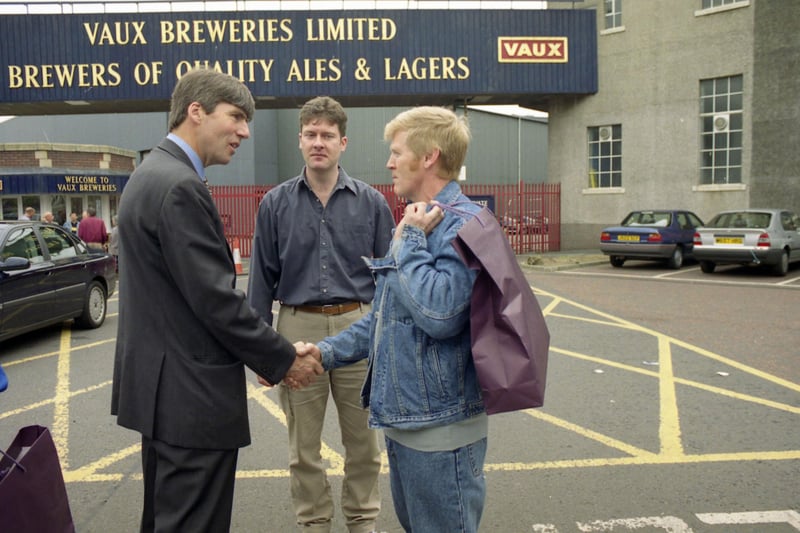 Workers on their last day at Vaux in July 1999, shaking hands with Frank Nicholson.