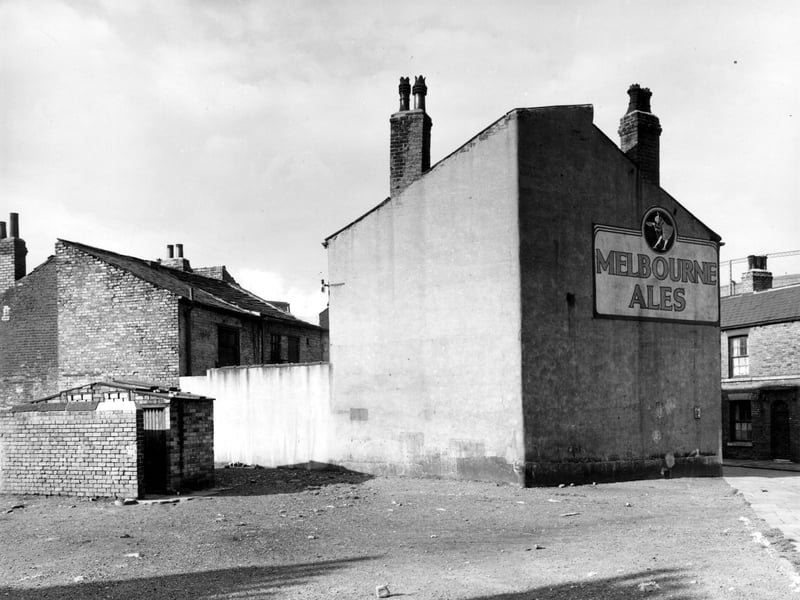 This 1950s view looks across an area of open land onto the side of the Pine Apple Inn at number 4 Ivory Street in Hunslet. The landlord at this time was James Close.