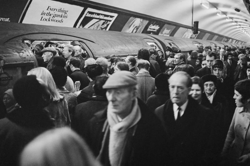 Commuters on a busy London Underground platform during rush hour, (Photo by Evening Standard/Hulton Archive/Getty Images)