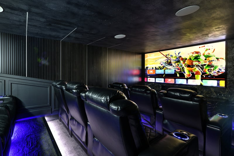 The cinema room in The Grandstand suite - it boasts 10 leather recliners and a 100" 4K Ultra HD smart TV