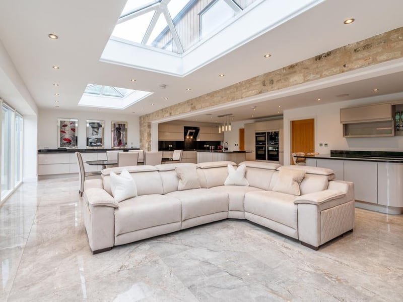 This bright open plan space must be one of the most versatile spaces on the Sheffield property market with the facilities to cook, dine, entertain and relax.