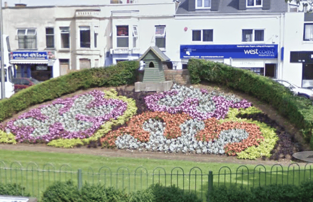 In August 2011, there was no clock but the flowers were looking beautiful