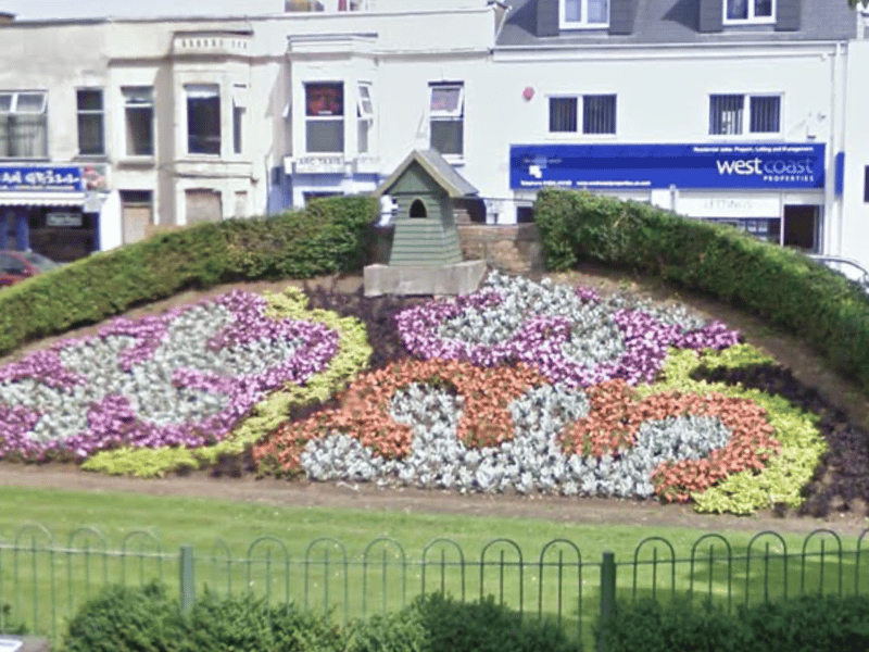 In August 2011, there was no clock but the flowers were looking beautiful