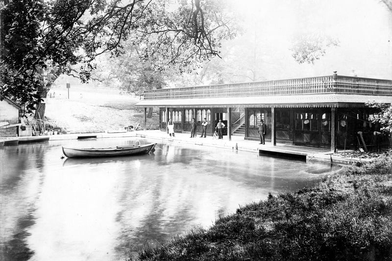  Newly constructed boathouse, located at the north-west corner of Waterloo Lake. It was built of redwood and varnished pitch-pine. The roof provided a viewing point. A central fight of steps led to the lakeside. Workmen are posing for the camera. Pictured in June 1902.