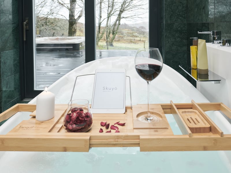 Enjoy a drink in the bath while taking in the view.