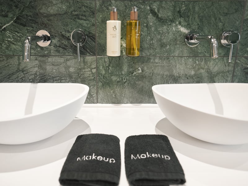 The bathroom has the added luxury of his-and-hers sinks.