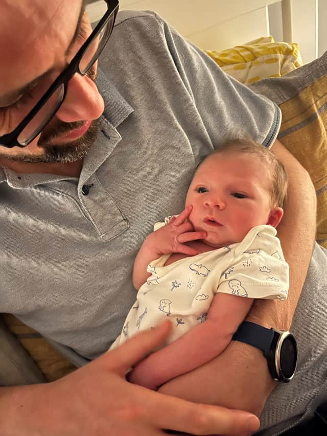 Baby Max with his dad, Morgan.