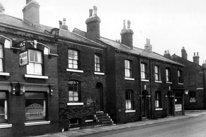 Albert Inn on  South Accommodation Road pictured in October 1958. This pub was known locally as the Pocket Hole because it was so small, and was frequented by workers from the Donisthorpe Lax and Shaw Works. The landlord at this time was Ted Wood who provided the machine operators with as much beer as they could drink while they were working. These workers consumed on average about 8 pints per shift although some were known to drink up, to 20. The incredibly hot working conditions caused by the furnaces used to melt the glass meant that the workers sweated all of the alcohol out of their bodies.