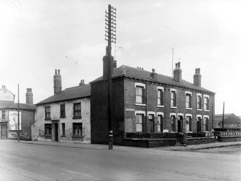 The large building on the left with the crumbling white render is number 57 Thwaite Gate, the Fenton Arms Public House, a Red Label pub. Pictured in July 1959.