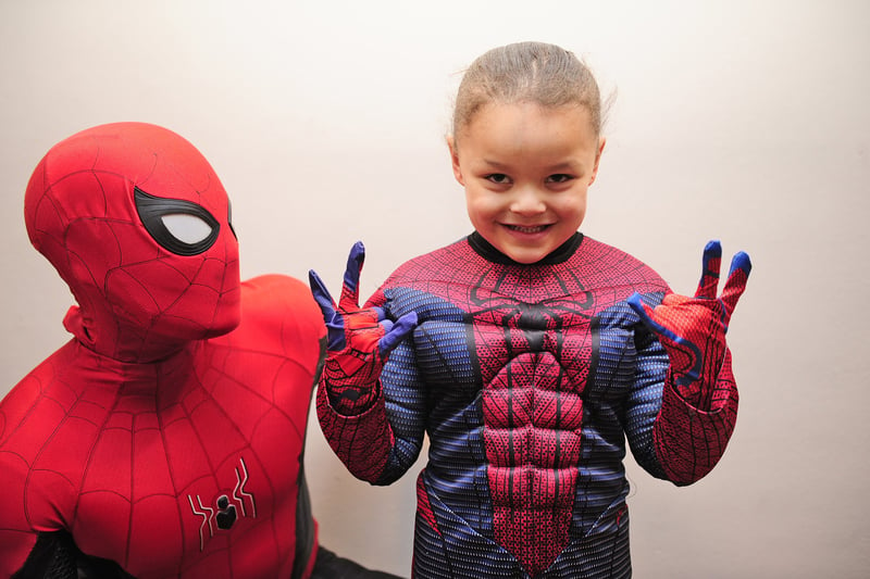 Ruben Sams, four, meets his hero Spiderman.