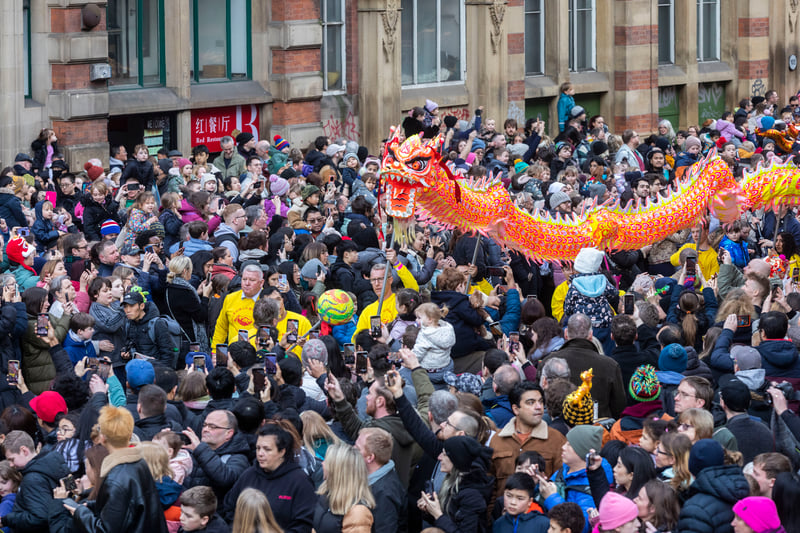 The 175ft dragon made it's way through the city to celebrate the Year of the Dragon