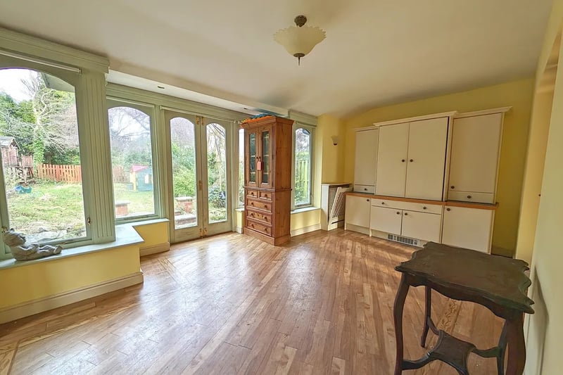 The dining room has large windows and French doors facing the enclosed rear garden. Photo courtesy of Zoopla