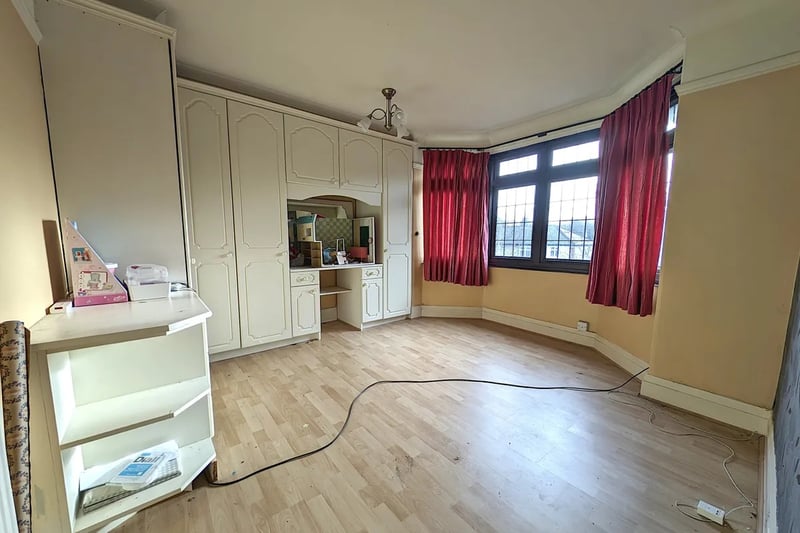 The main bedroom features a large window facing the front of the property, and a fitted wardrobe, ideal for storage. Photo courtesy of Zoopla