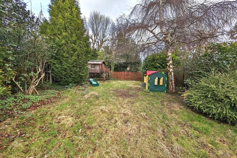 The home boasts a private and enclosed garden with lots of potential. To the rear is a gate leading to further wild garden area. Photo courtesy of Zoopla.