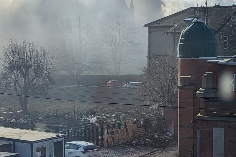 Photos taken by witnesses showed the church completely obscured by the smoke.