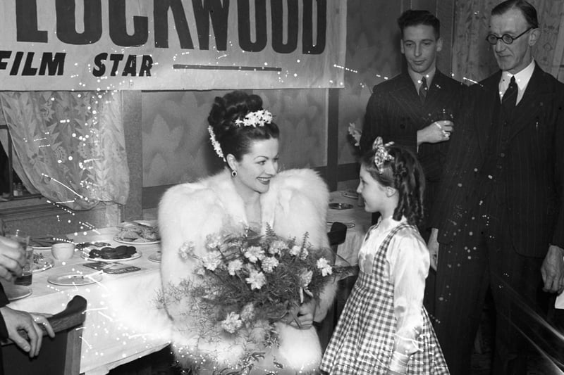 More than 1,000 fans waited outside the Havelock Cinema to see the star of The Lady Vanishes in 1947.
Here she is in Sunderland receiving a bouquet from Jill Greaves.