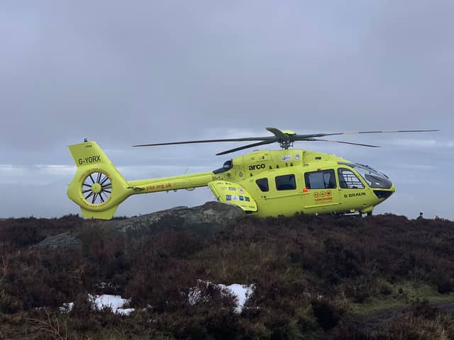 The Yorkshire Air Ambulance at the scene of a Peak District rescue on Saturday after a plunge from rocks. Picture: Edale Mountain Rescue