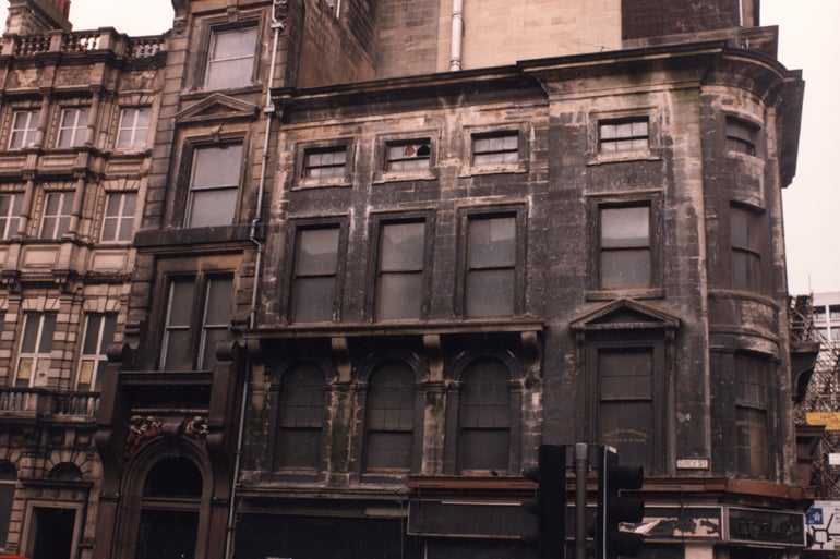 A view of Grey Street Newcastle upon Tyne taken in 1989. The photograph shows the former 'Amigos' restaurant on the corner of Grey Street and Mosley Street. 