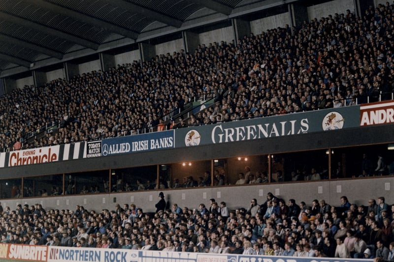 A photograph of one of the stands filled with people St. James Park Newcastle upon Tyne taken c.1989.