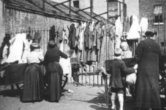 Another early image of a makeshift clothing stall at the Barras