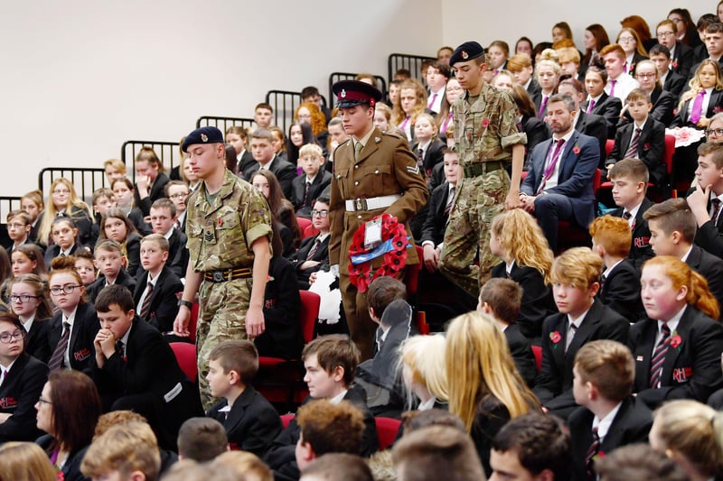 Red House students and army Cadet members (left to right) Connor Dale, Brandon Cummings and Mytchell Charlton made their way past fellow pupils during the school's remembrance service in 2018.