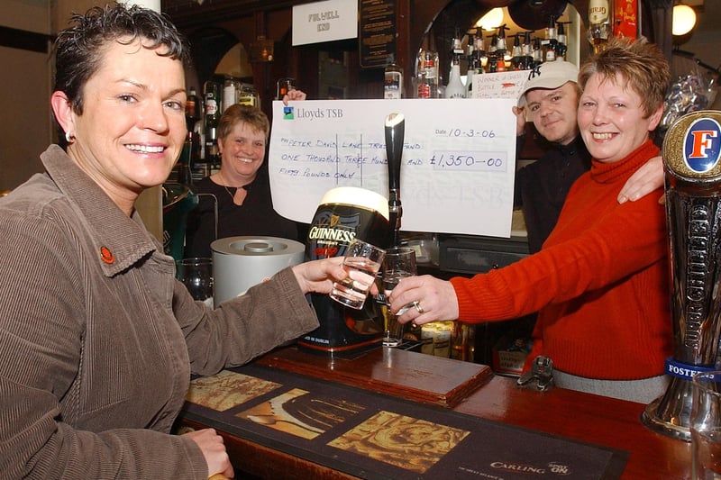 Staff and customers raised money for charity and here's the day it was handed over in 2006.