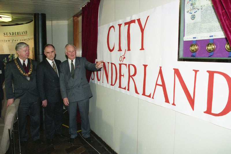 The City of Sunderland's new flag unveiled by Mayor David Thompson, Chief Executive Geoffrey Key, and Council Leader Eric Bramfitt.