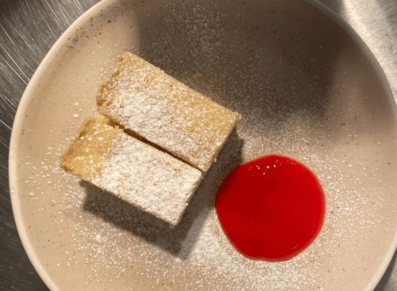 Shortbread and raspberry coulis. 
