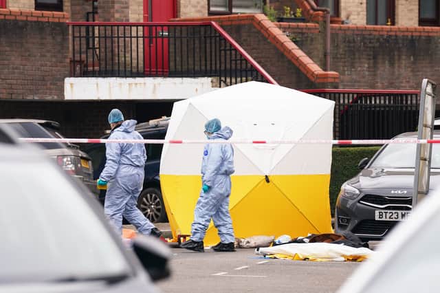 Forensic officers at the scene near Bywater Place in Surrey Quays, south east London, after 30-year-old Bryce Hodgson, from Sheffield, was shot dead. Picture: Lucy North/PA Wire