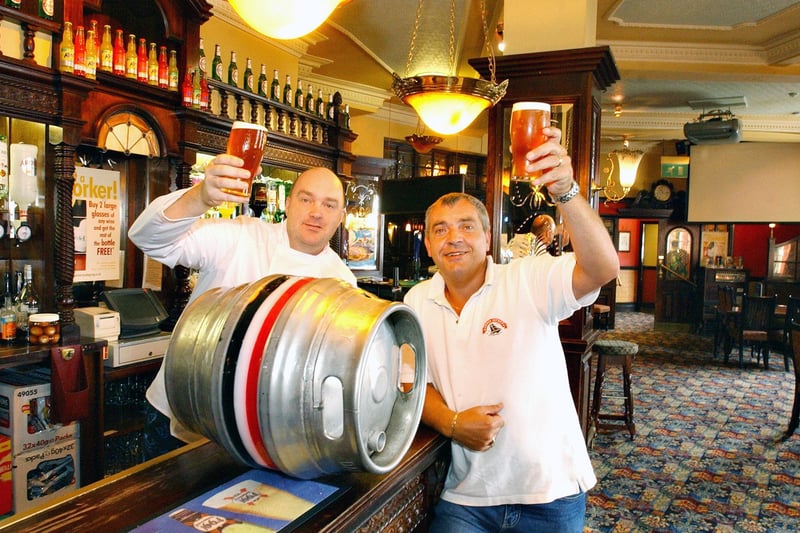 Paul Stevenson and brewer Dave Smith were trying out a 100 year old recipe for a beer in this Echo photo from 2004.