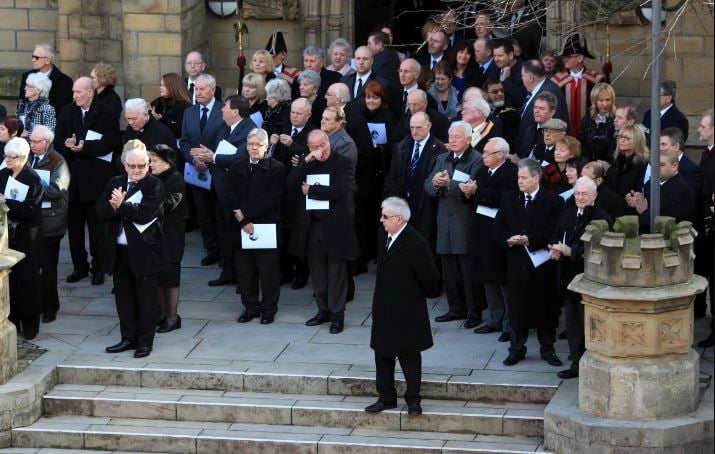 Mourners on the steps of Preston Minster