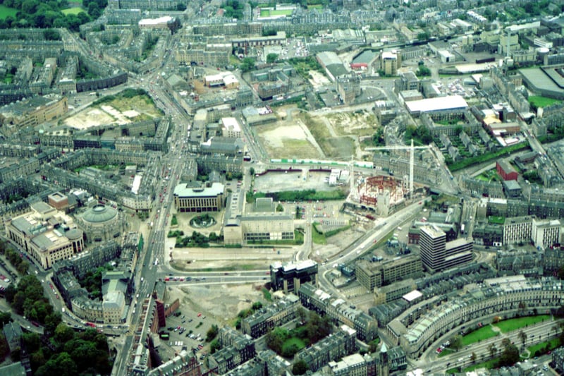 Aerial photo of the Lothian Road area of Edinburgh looking roughly south, October 1993. Reference points: Kings Stables Road bottom left; Usher Hall left, West Approach Road right; and construction of the EICC right middle.