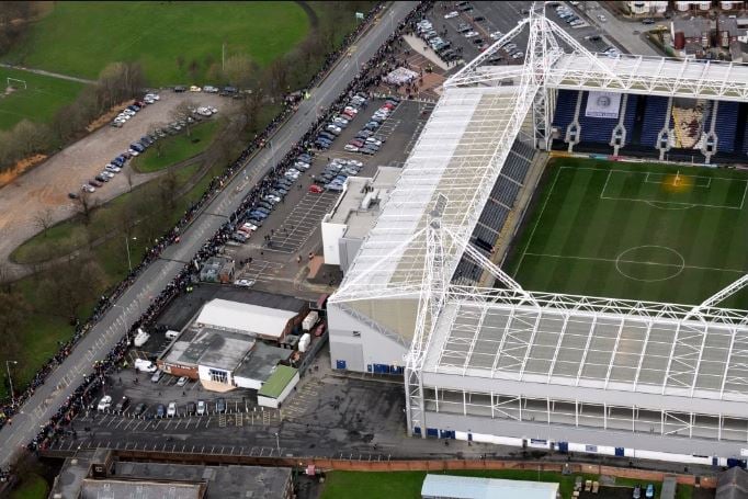Mourners lined the streets outside Deepdale to watch the funeral courtege
