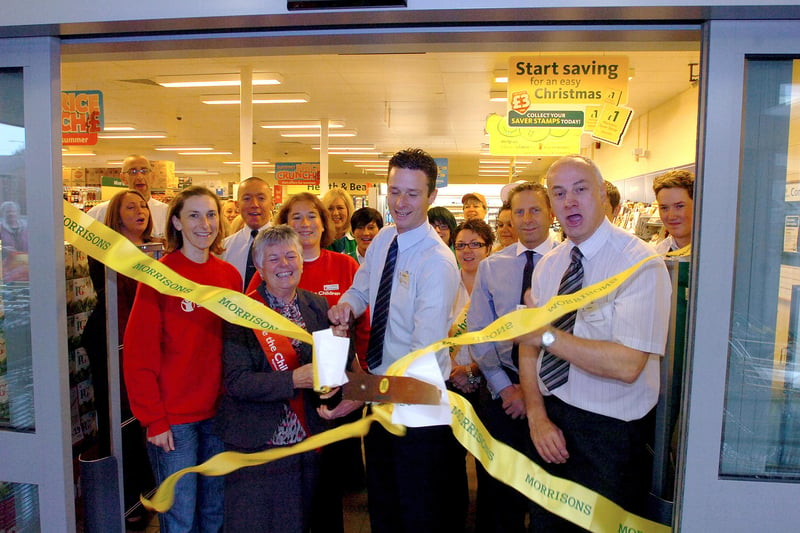 Cutting the ribbon to officially open the new Morrisons store in Castle View, Castletown, in 2011.