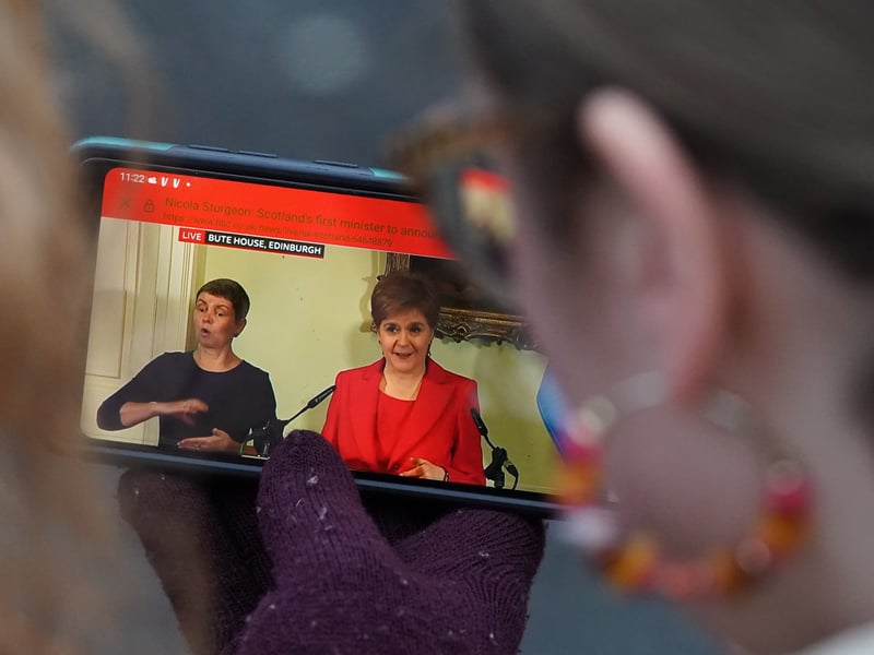 Members of the public gathered outside Bute House in Edinburgh to watch the press conference where First Minister Nicola Sturgeon announced she would stand down as First Minister for Scotland after eight years.