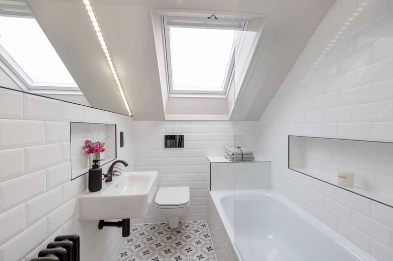 The bright and welcoming family bathroom situated on the first floor.