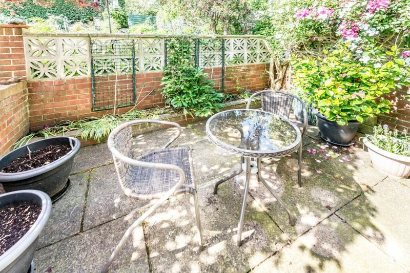 A patio area of the garden, close to the house, is perfect for outdoor dining.