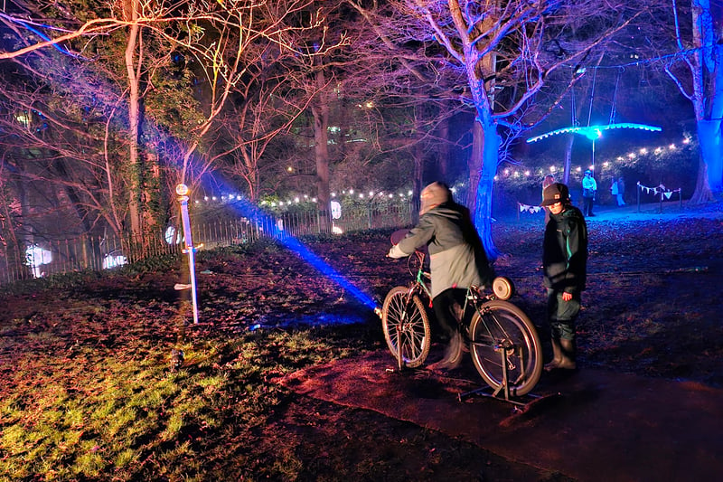 Next to the Woodwide Web, visitors can power up one of the light installations by cycling.
