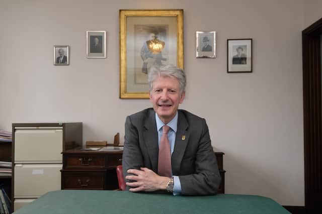 H.L. Brown managing director James Frampton in his office in front of the pictures of his forebears who ran the company before him