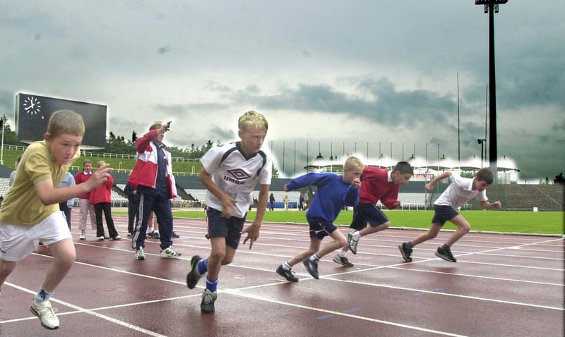 Pupils compete in the year 6 boys 60 metre sprint race heat during the Westfield School sports day at Don Valley Stadium, Sheffield