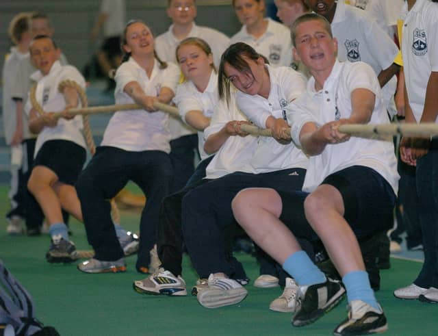 All Saints School pupils take the strain in the tug of war competition during their sports day in June 2005