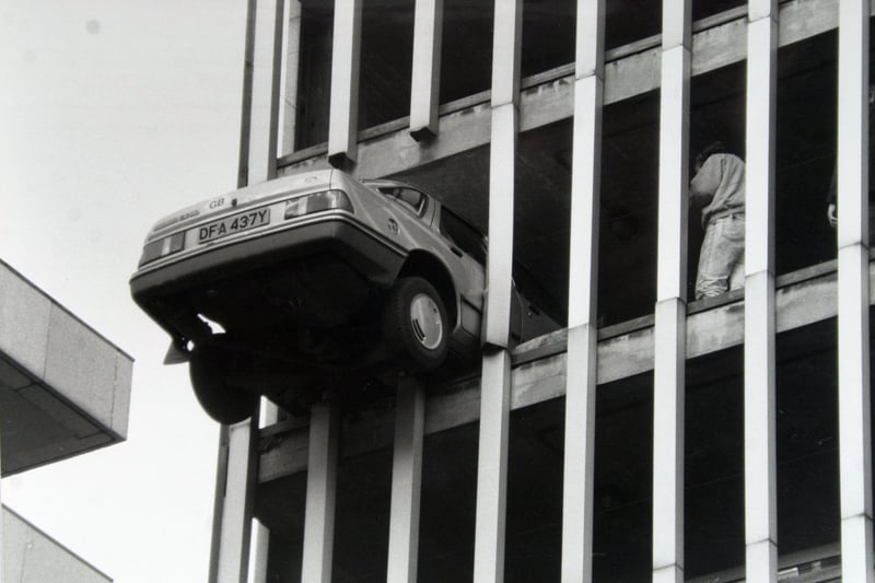 A car sits precariously on the edge of disaster in Greek Street car park in March 1988.
