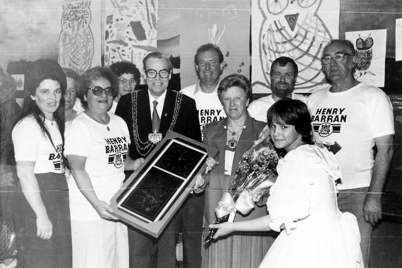 A group photo taken at the Henry Barran Centre on the occasion of its Golden Anniversary. The Lord Mayor, Councillor Arthur Vollans is pictured presenting his gift of an ornamental wall-clock to the Henry Barran Centre Management Committee. Local people were invited to enjoy a buffet meal at 1938 prices, and take part in fun activities and competitions. Pictgured, from left, are Linda Bosomworth, Coun Lorna Cohen, Lily Shackleton, Lord Mayor, Coun Arthur Vollans, Coun Terry Briggs, the Lady Mayoress, Warden, John Holmes, Eddie Manning and Michelle Houghton, about to present the Lady Mayoress with a bouquet.